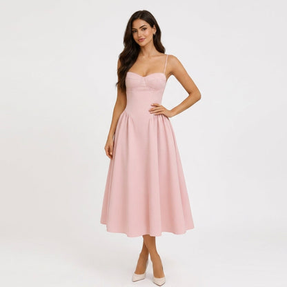 Pink Corset A-Line Midi Dress – front view with hand on waist