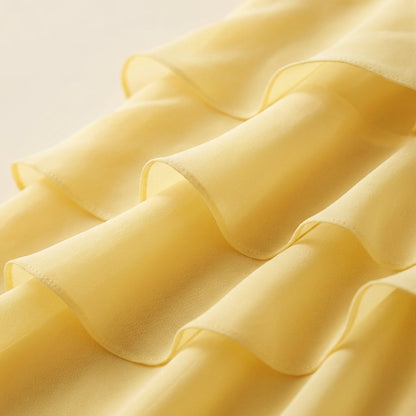 Yellow Tiered Ruffle Maxi Dress – close-up of layered ruffle fabric