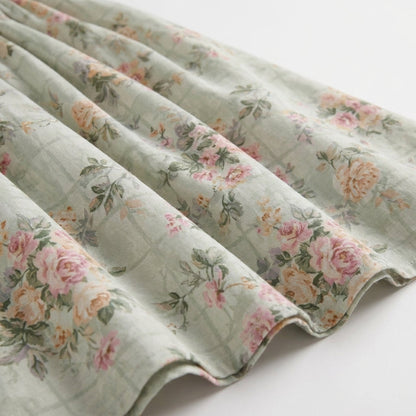 Corset Tie-Front Midi Dress in Green Floral – close-up of floral fabric