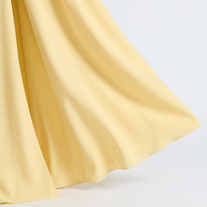 Strapless Pleated Maxi Dress with Thigh Split in Yellow – close-up of pleated skirt