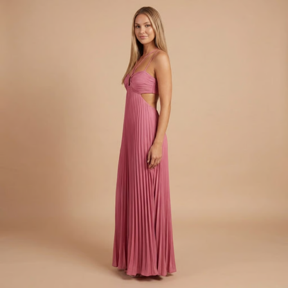 Pleated Halter Cut-Out Maxi Dress in Pink – side view showing waist cut-out