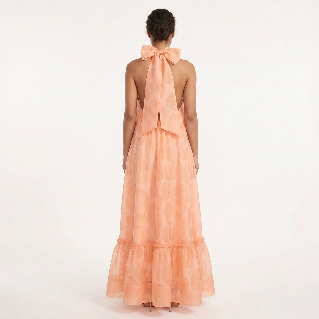 Orange Print Halter Maxi Dress – back view showing bow tie and open back