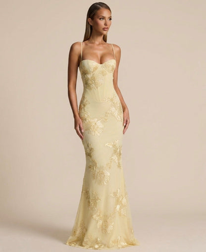 Yellow Floral Appliqué Corset Maxi Dress – front view in a studio