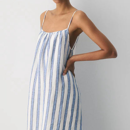 Close-up of striped slip dress with fine straps and side profile
