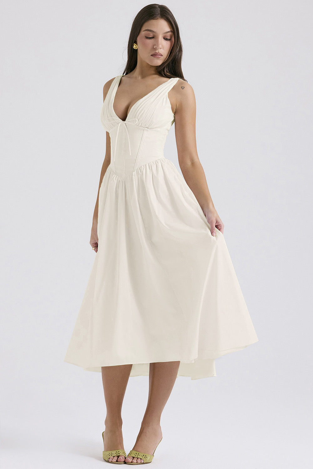 Ruched V-Neck Flared Midi Dress in White – front view
