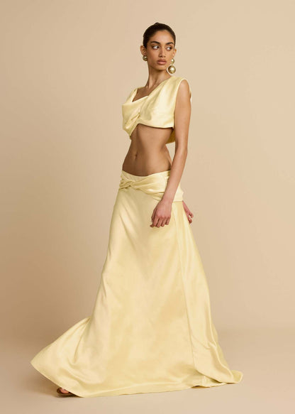 Yellow Twist Crop Top & Maxi Skirt Set – three-quarter view showing skirt train
