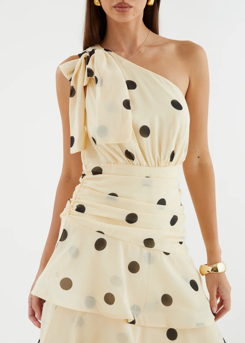 White Polka Dot One-Shoulder Midi Dress – close-up of bow and ruched waist