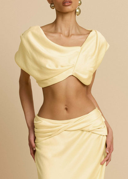 Yellow Twist Crop Top & Maxi Skirt Set – close-up of twist crop top and skirt waist