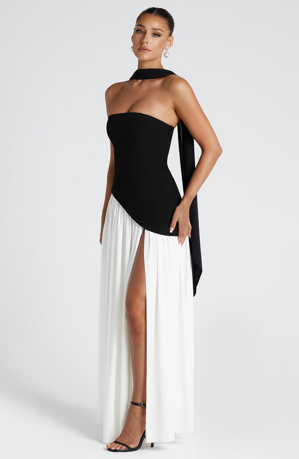 Strapless Pleated Maxi Dress with Thigh Split in Black & White – front view, black bodice with white skirt