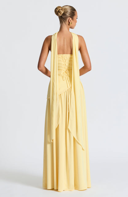 Strapless Pleated Maxi Dress with Thigh Split in Yellow – back view showing lace-up back