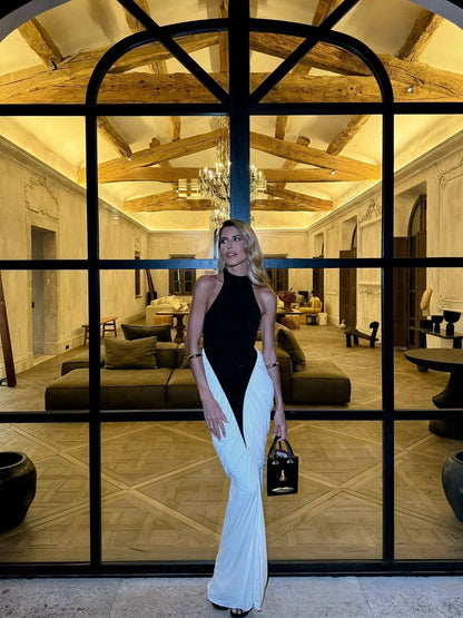 Black and White Backless Maxi Dress – lifestyle view in a hall