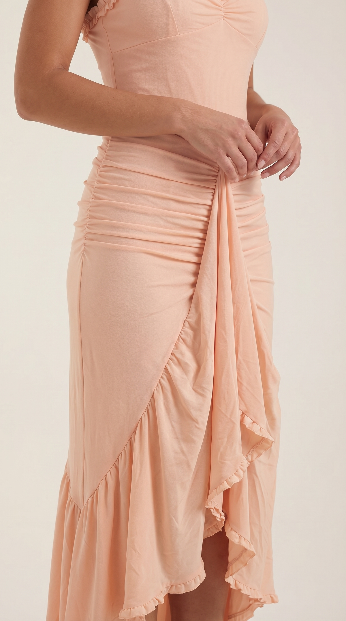 Ruffle Trim High-Low Maxi Dress in Blush – close-up of ruched skirt and ruffle